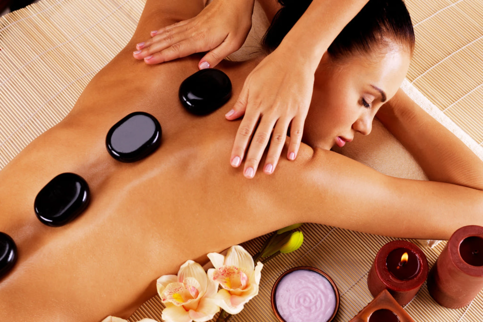 Hot stone massage in Bali with heated volcanic stones